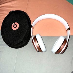 Rose gold beat headphones